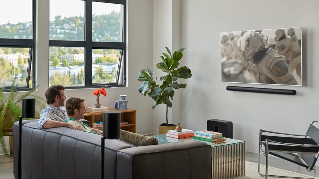 Sonos Arc Ultra, Sub 4, 2 x Era 100 setup living room couple