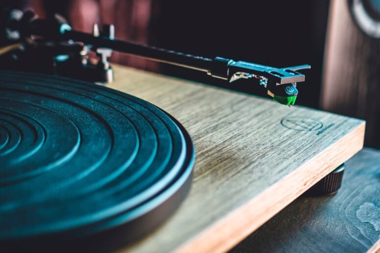 The stylish, belt-driven Audio-Technica turntable with a simulated walnut veneer finish
